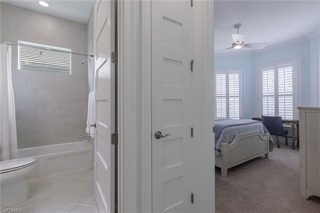 5906 Haiti Drive Naples, FL 34113 - Photo 22 of 44 a spacious bathroom with a shower and a toilet