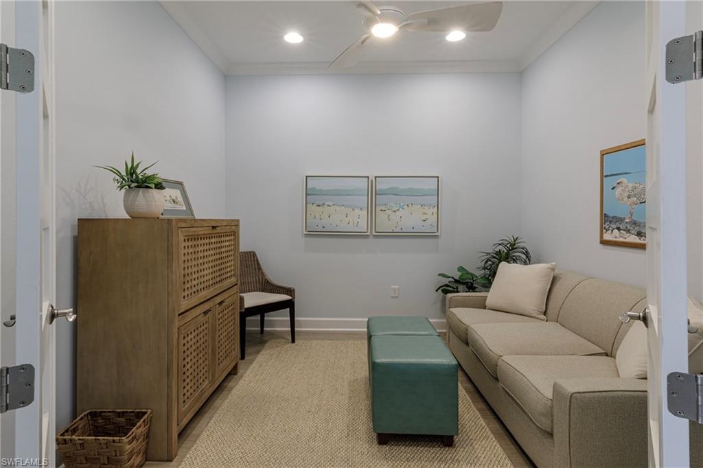 5906 Haiti Drive Naples, FL 34113 - Photo 25 of 44 a living room with furniture and a potted plant