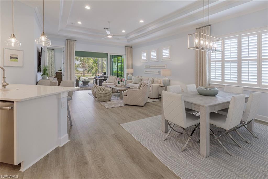 5906 Haiti Drive Naples, FL 34113 - Photo 4 of 44 a view of a dining room with furniture window and outside view