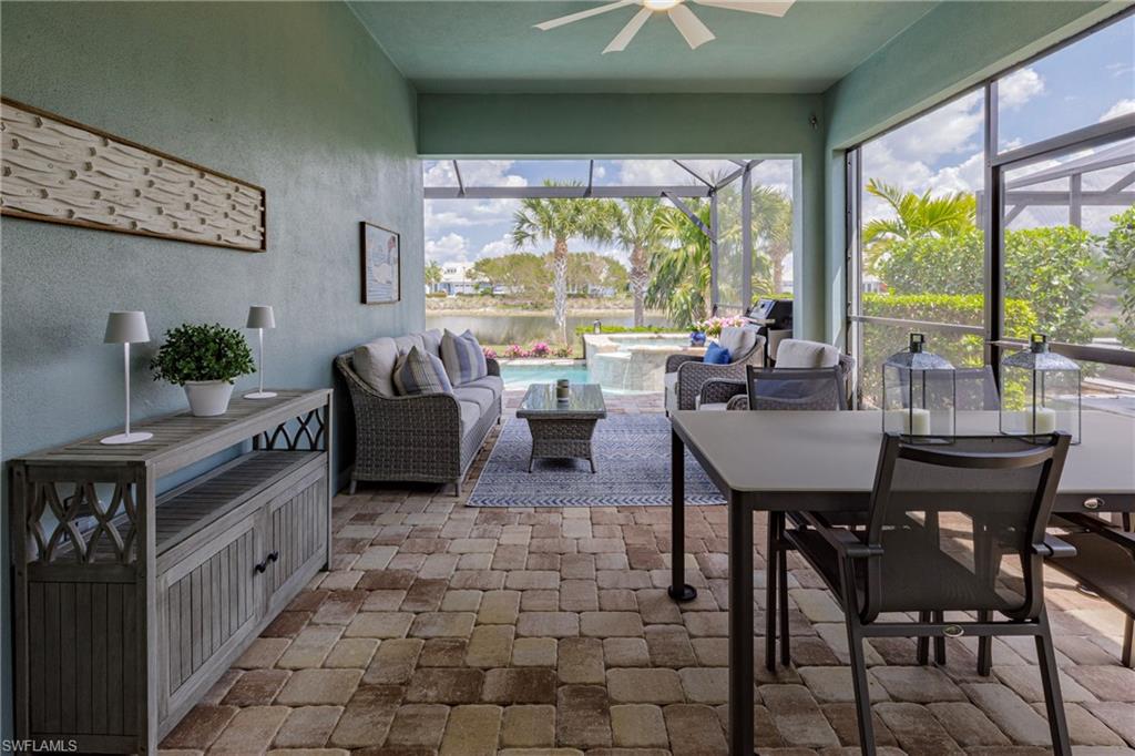 5906 Haiti Drive Naples, FL 34113 - Photo 6 of 44 a living room with furniture and a large window