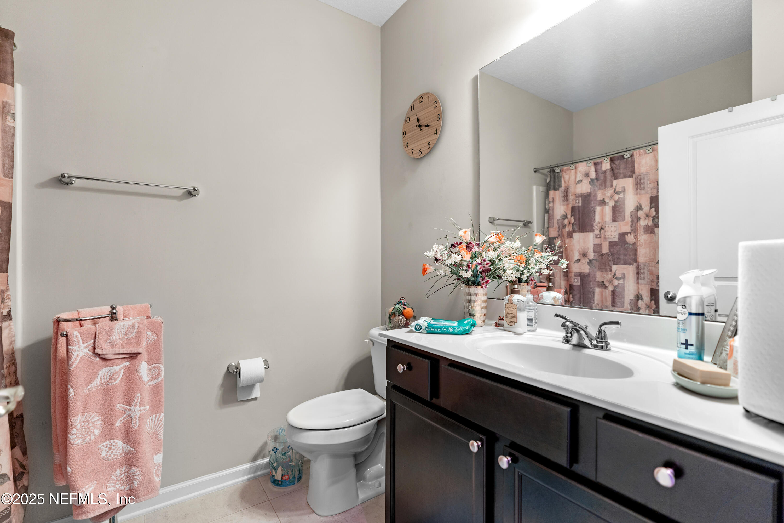 3165 Chestnut Ridge Way Orange Park, FL 32065 - Photo 19 of 35 a bathroom with a sink vanity granite and toilet