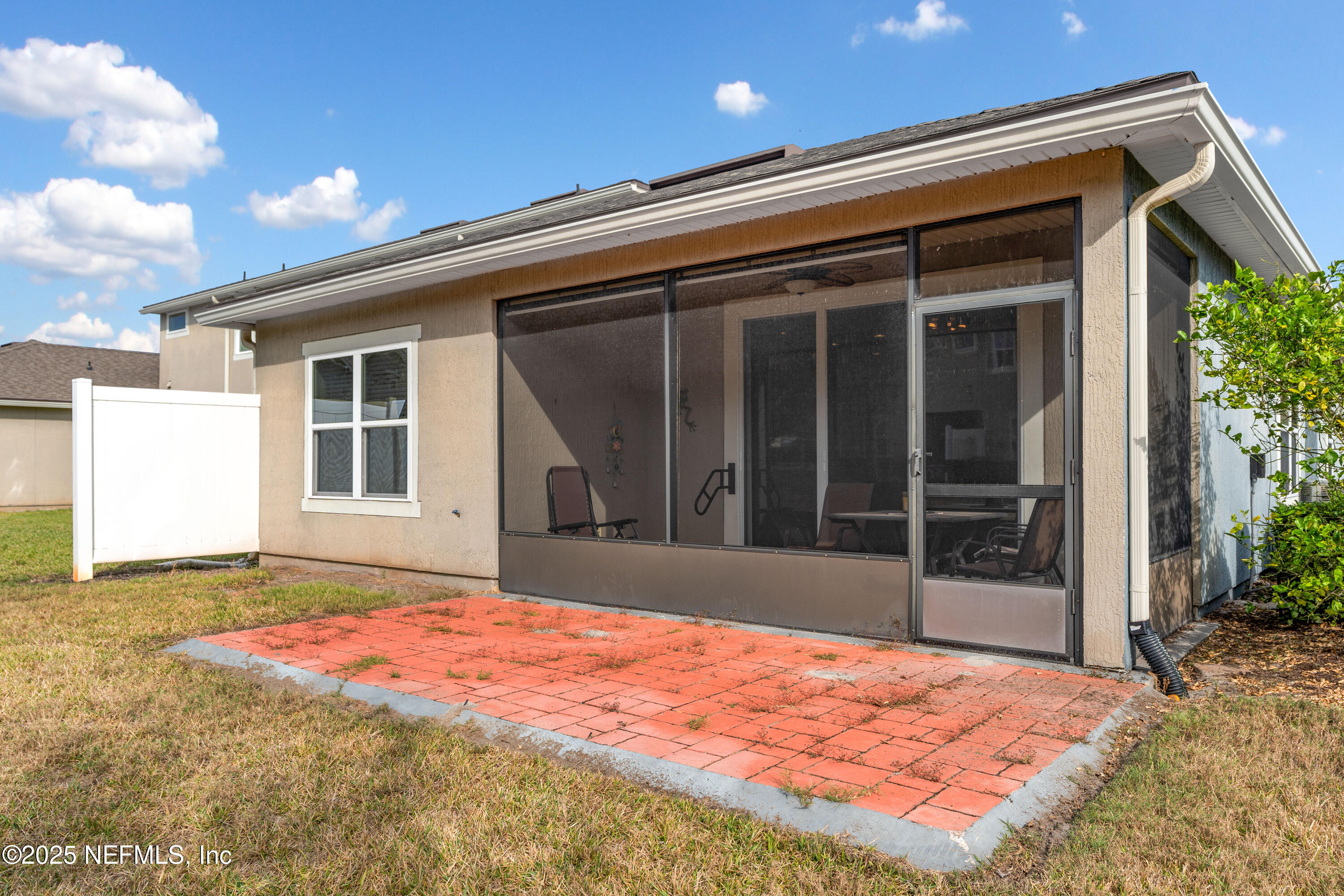 3165 Chestnut Ridge Way Orange Park, FL 32065 - Photo 28 of 35 a front view of a house with a garden