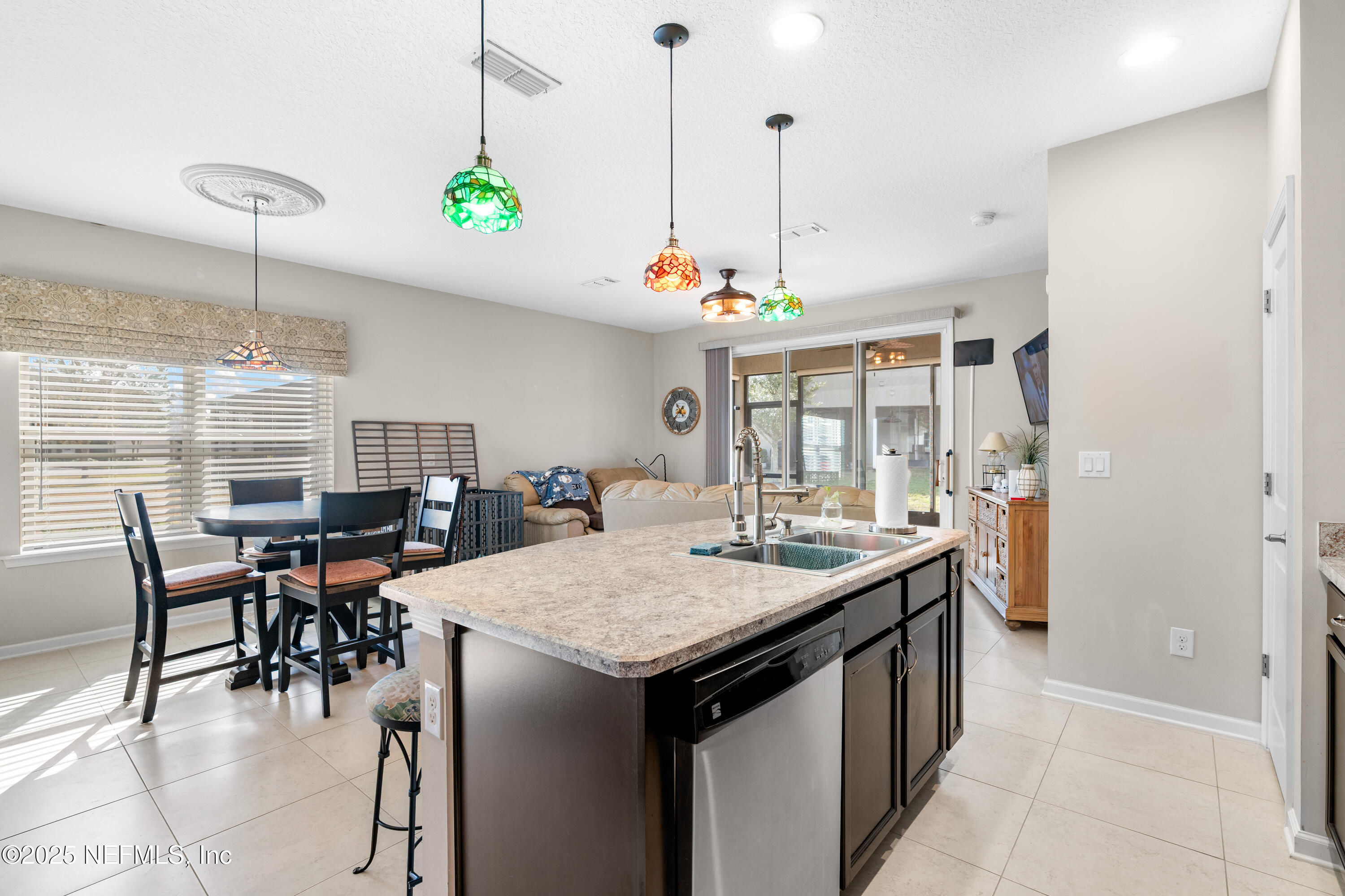 3165 Chestnut Ridge Way Orange Park, FL 32065 - Photo 8 of 35 a view of a dining room and livingroom