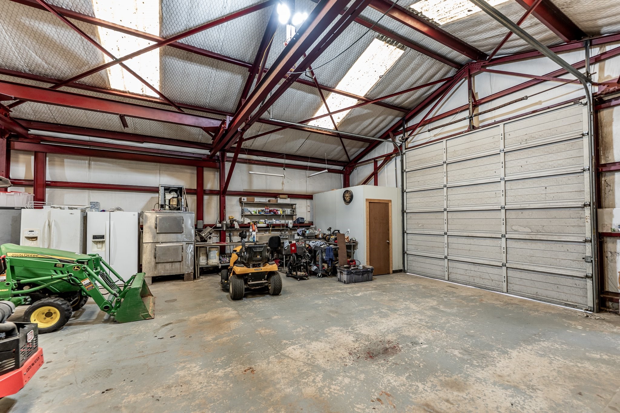 13334 Fultz Road Conroe, TX 77304 - Photo 31 of 49 The 60x40 insulated shop is fully equipped with electric, plumbing, and a private restroom—ideal for projects, storage, or serious hobbies.