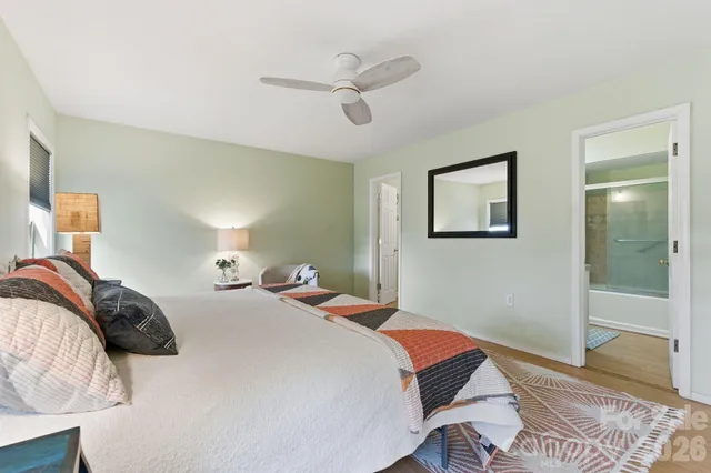 a bedroom with a bed and a cabinets