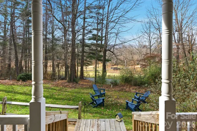 a front view of a house with garden view