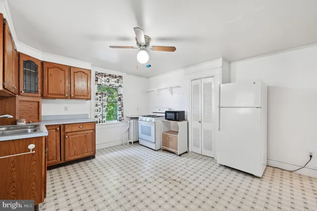 a view of a kitchen with a sink
