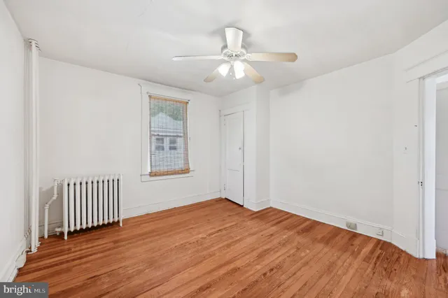 a bathroom with a toilet a sink and bathtub