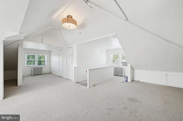 a view of a balcony with wooden floor