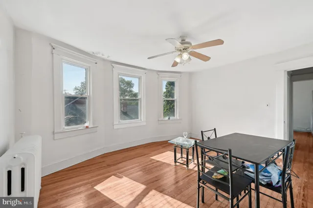 a kitchen with a stove a sink a window and stainless steel appliances