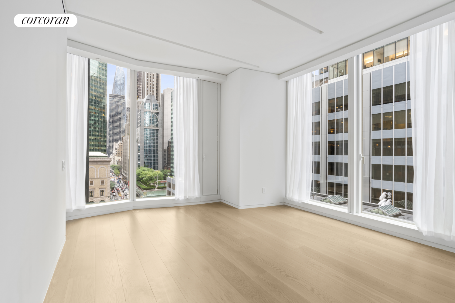 100 East 53rd Street, Unit 10A Manhattan, NY 10022 - Photo 22 of 35 a view of an empty room with a window