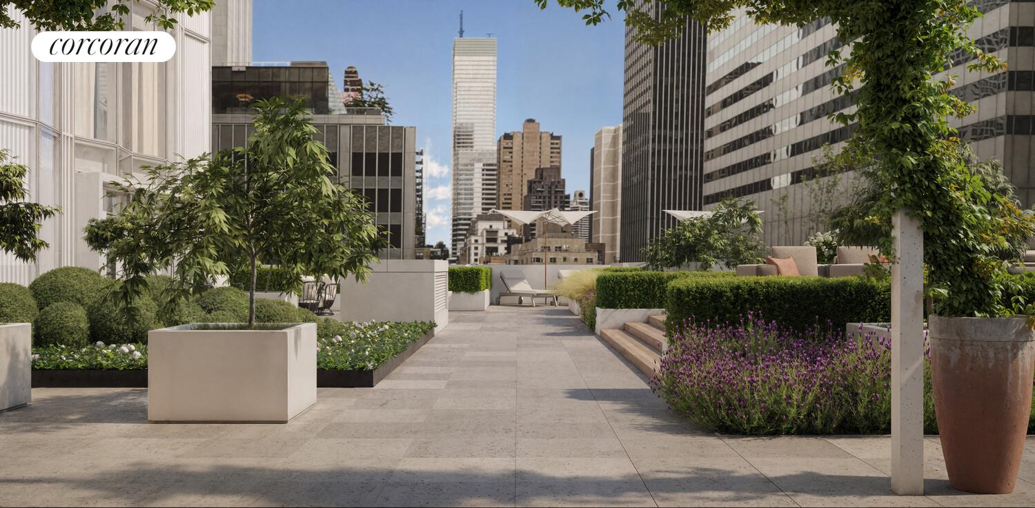 100 East 53rd Street, Unit 10A Manhattan, NY 10022 - Photo 4 of 35 a view of a fountain in the middle of a city