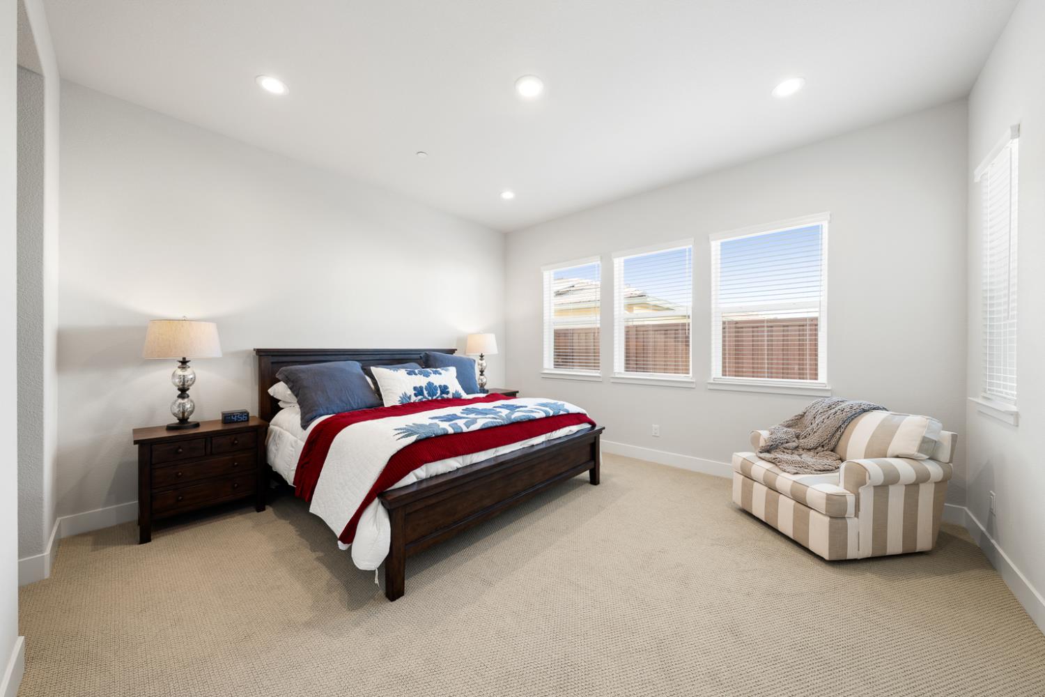 4228 Grey Hawk Street Folsom, CA 95630 - Photo 22 of 49 a spacious bedroom with a bed and window