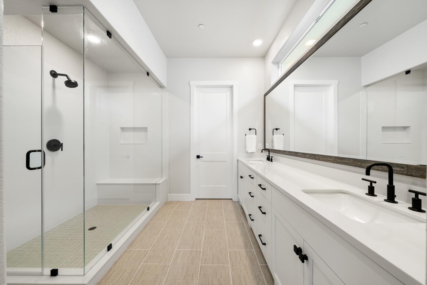 4228 Grey Hawk Street Folsom, CA 95630 - Photo 23 of 49 a spacious bathroom with a tub sink mirror and shower