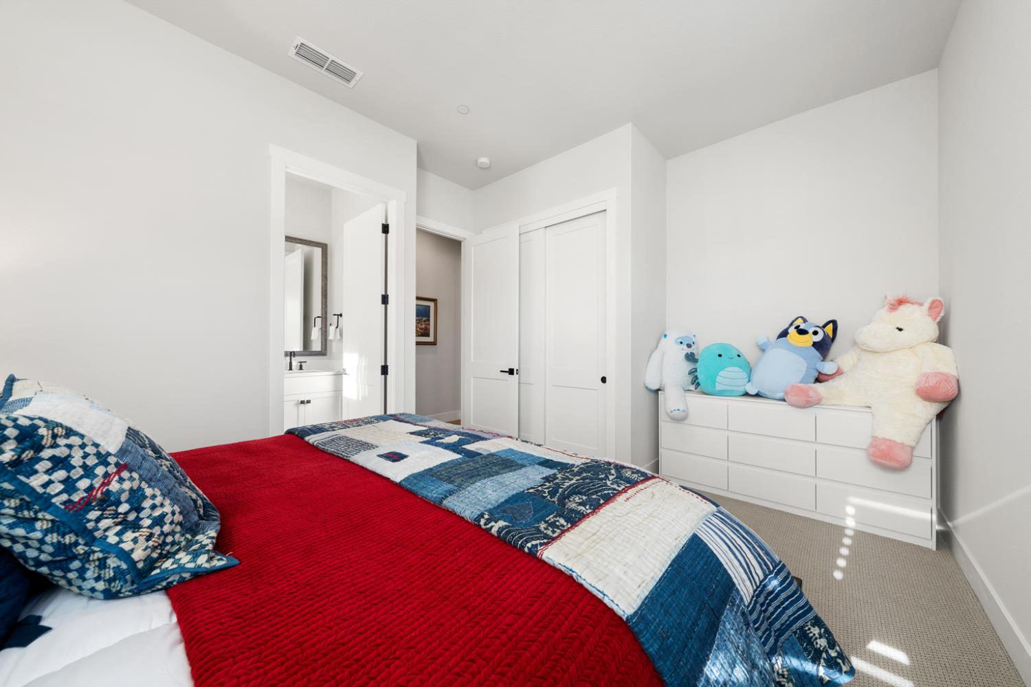 4228 Grey Hawk Street Folsom, CA 95630 - Photo 27 of 49 a bedroom with a bed and a dresser