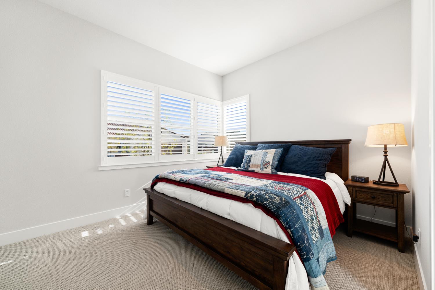 4228 Grey Hawk Street Folsom, CA 95630 - Photo 28 of 49 a bed sitting in a bedroom next to a window