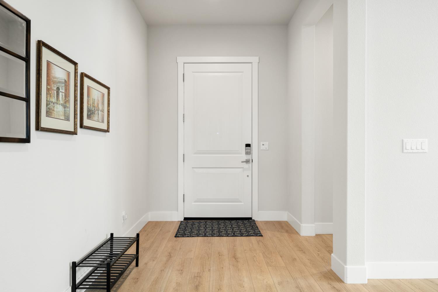 4228 Grey Hawk Street Folsom, CA 95630 - Photo 30 of 49 a view of a hallway with wooden floor