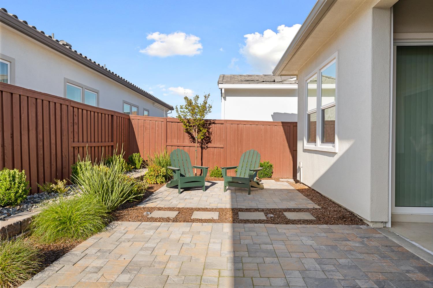 4228 Grey Hawk Street Folsom, CA 95630 - Photo 41 of 49 a view of a backyard with sitting area
