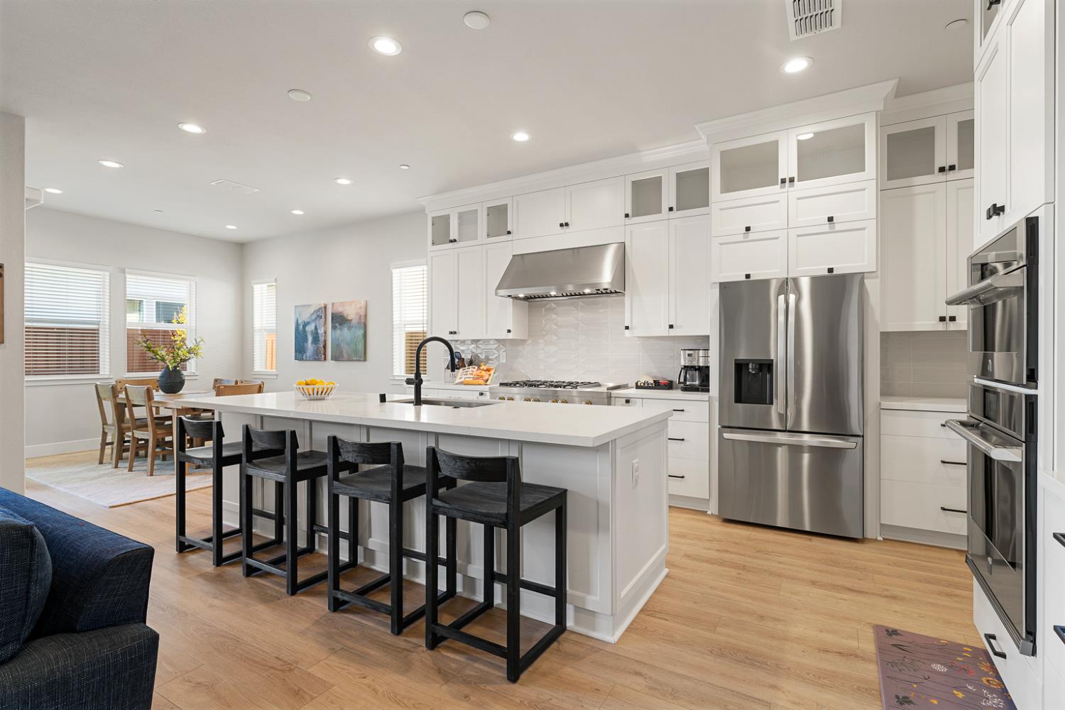 4228 Grey Hawk Street Folsom, CA 95630 - Photo 5 of 49 a large kitchen with stainless steel appliances lots of counter space and breakfast area