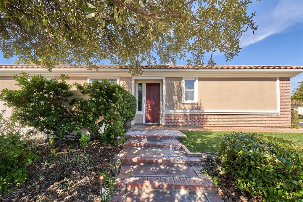 1143 Saguara Road Beaumont, CA 92223 - Photo 15 of 66 a front view of a house with garden
