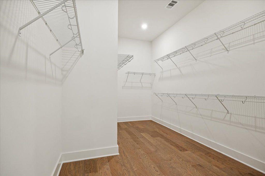 8280 Scarlett Grace Lane Gainesville, GA 30506 - Photo 13 of 48 a view of a room with racks on the wall