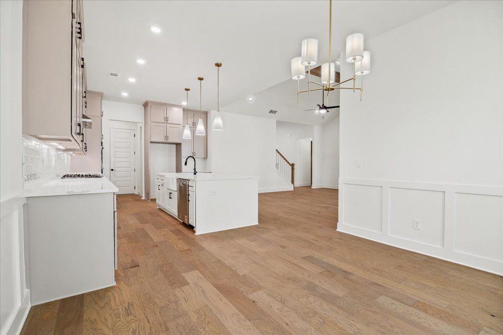 8280 Scarlett Grace Lane Gainesville, GA 30506 - Photo 24 of 48 a view of a kitchen with wooden floor