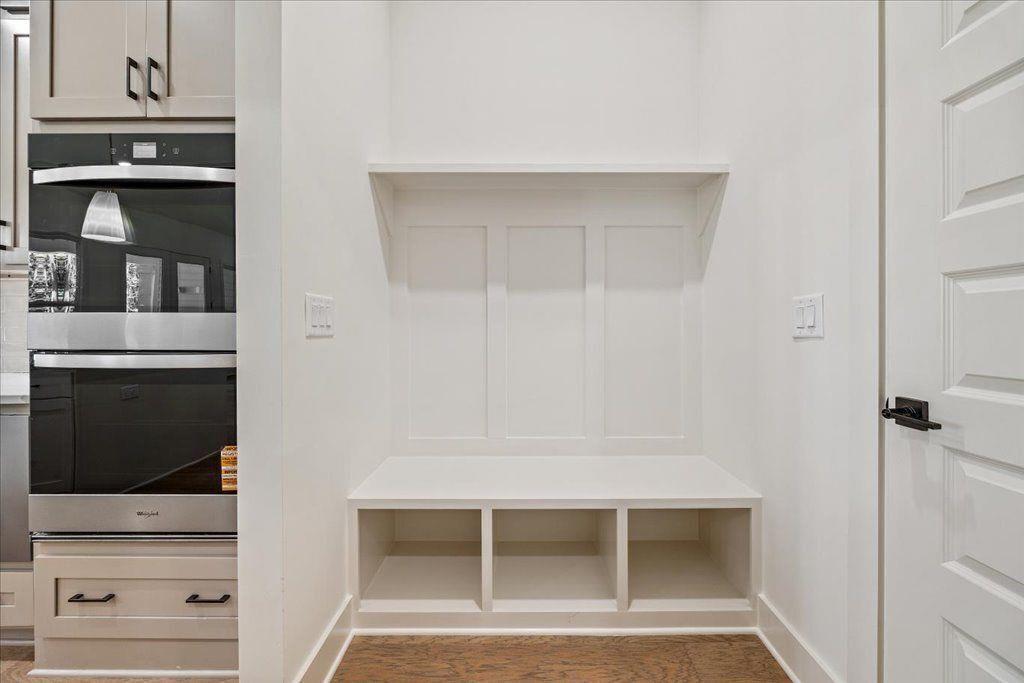 8280 Scarlett Grace Lane Gainesville, GA 30506 - Photo 30 of 48 a view of walk in closet with living room