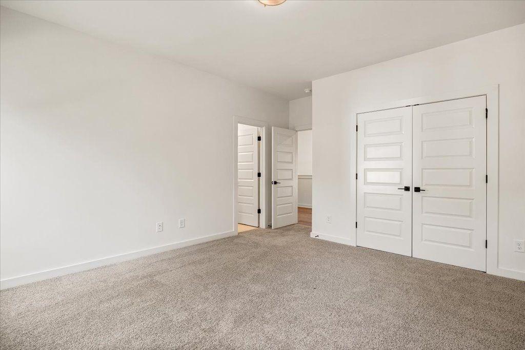 8280 Scarlett Grace Lane Gainesville, GA 30506 - Photo 36 of 48 an empty room with closet area