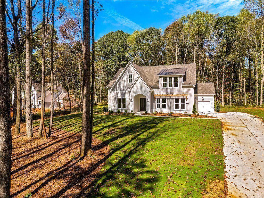 8280 Scarlett Grace Lane Gainesville, GA 30506 - Photo 5 of 48 a view of a house with a yard