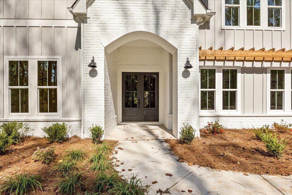 8280 Scarlett Grace Lane Gainesville, GA 30506 - Photo 7 of 48 a front view of a house