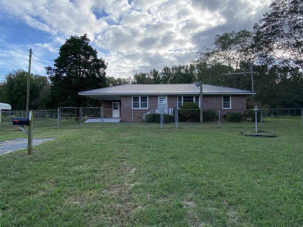 622 George Johnson Road Royston, GA 30662 - Photo 1 of 1 a view of a house with a yard and sitting area