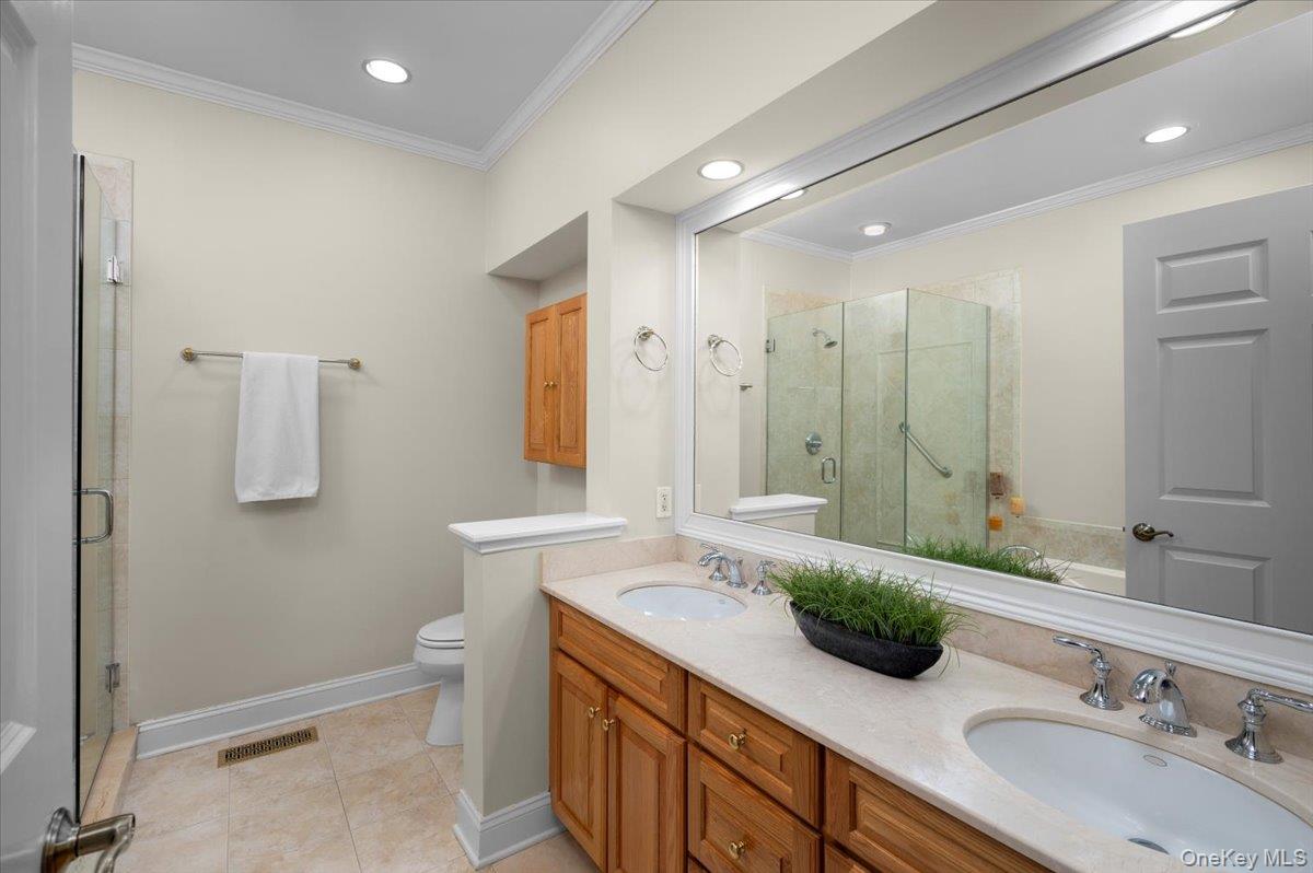 775 Scarsdale Road, Unit 7 Tuckahoe, NY 10707 - Photo 11 of 27 a spacious bathroom with a double vanity sink mirror and toilet