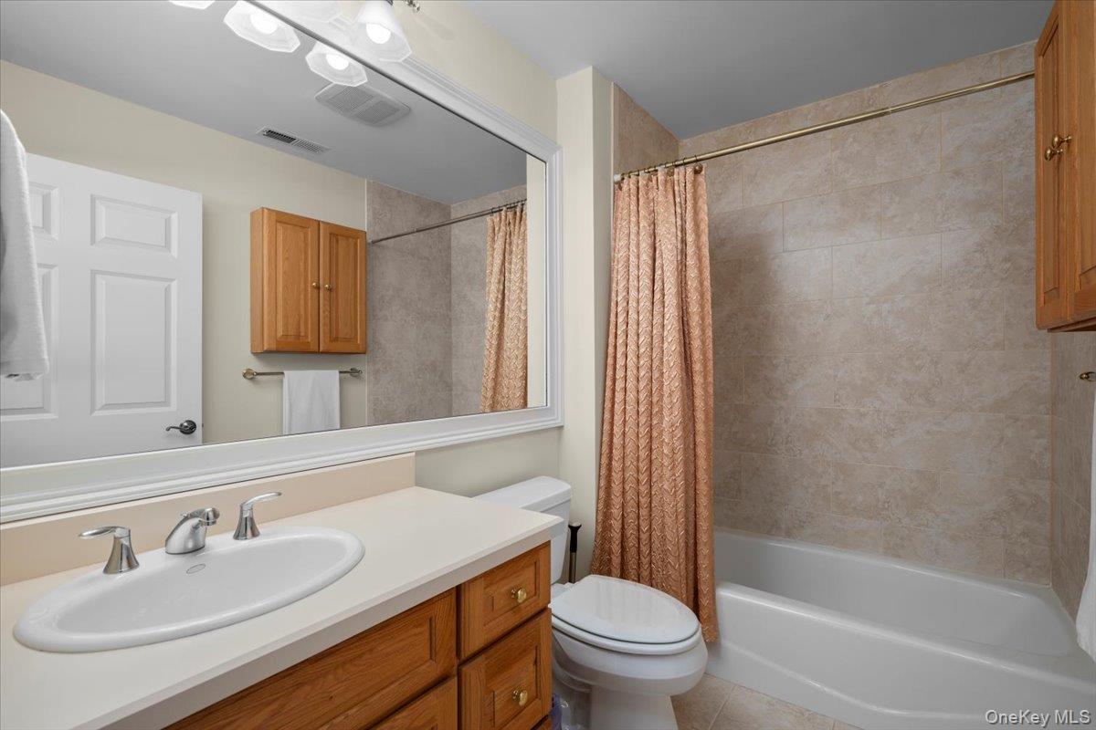 775 Scarsdale Road, Unit 7 Tuckahoe, NY 10707 - Photo 16 of 27 a bathroom with a sink toilet and shower