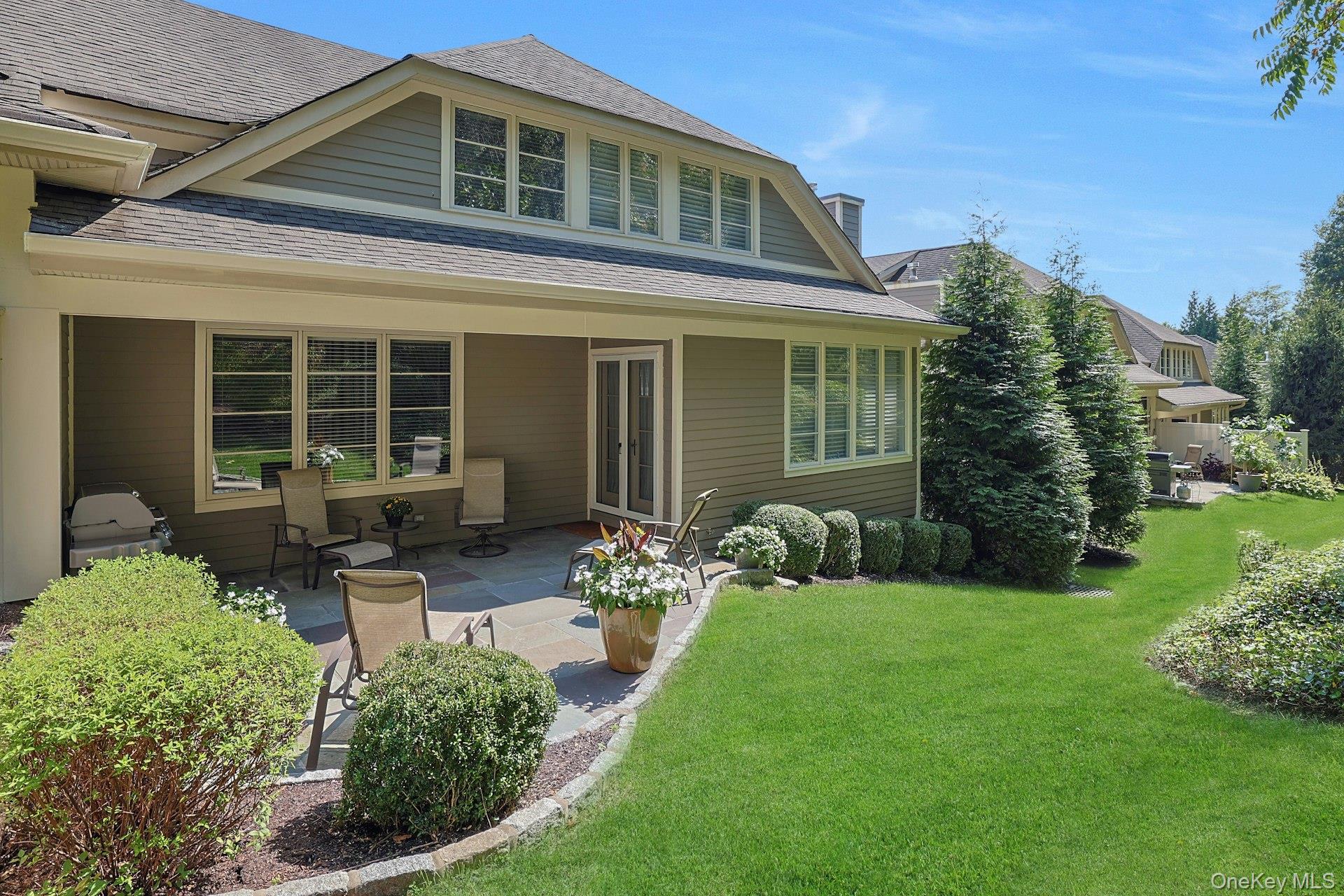 775 Scarsdale Road, Unit 7 Tuckahoe, NY 10707 - Photo 2 of 27 front view of a house with a yard