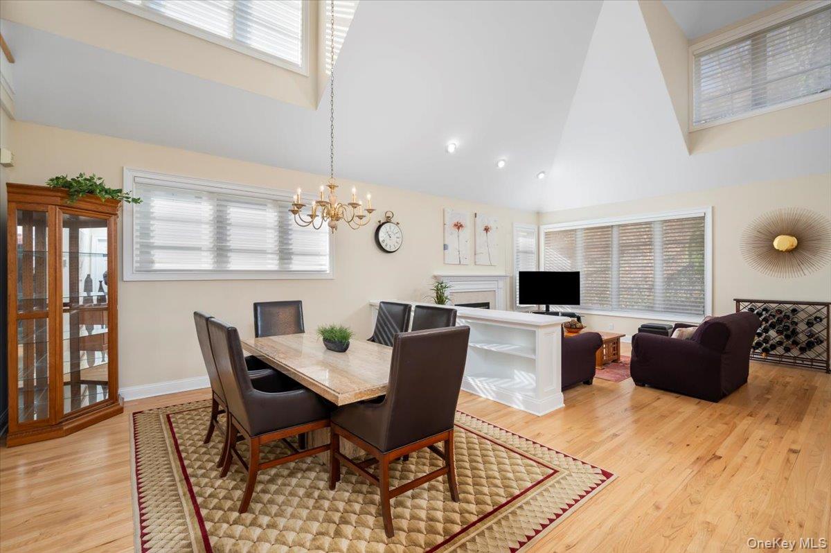 775 Scarsdale Road, Unit 7 Tuckahoe, NY 10707 - Photo 6 of 27 a living room with furniture a window and a flat screen tv