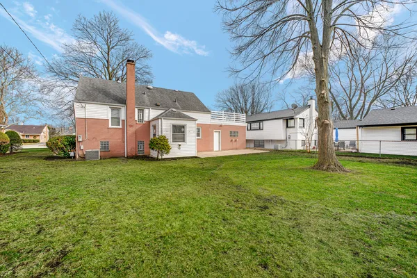 a view of a house with a big yard