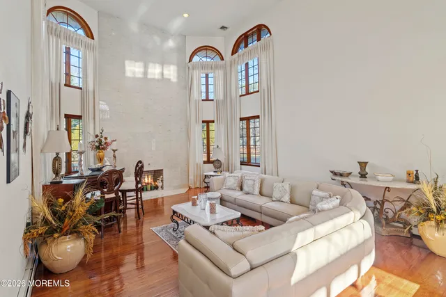 a kitchen with stainless steel appliances granite countertop wooden cabinets a oven and granite counter tops with a stove