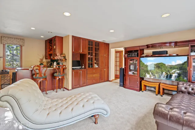 a view of a bathroom with a sink and a mirror