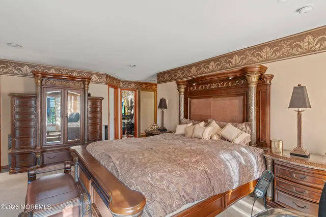 a bathroom with a sink a toilet and shower curtain