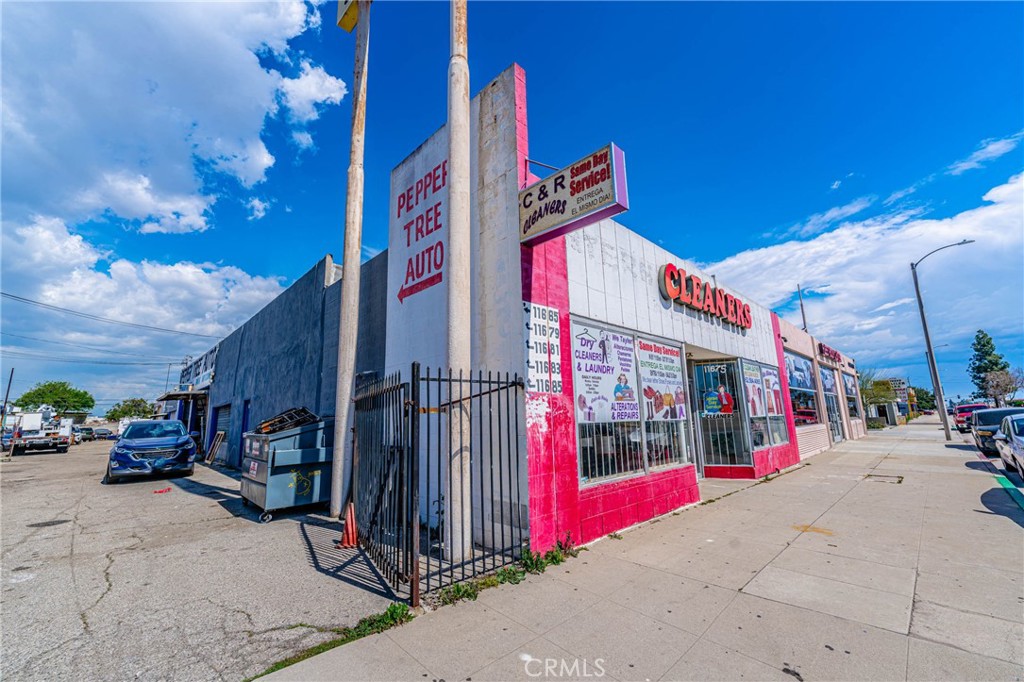 11669 Firestone Boulevard Norwalk, CA 90650 - Photo 5 of 23 a street sign on a street corner