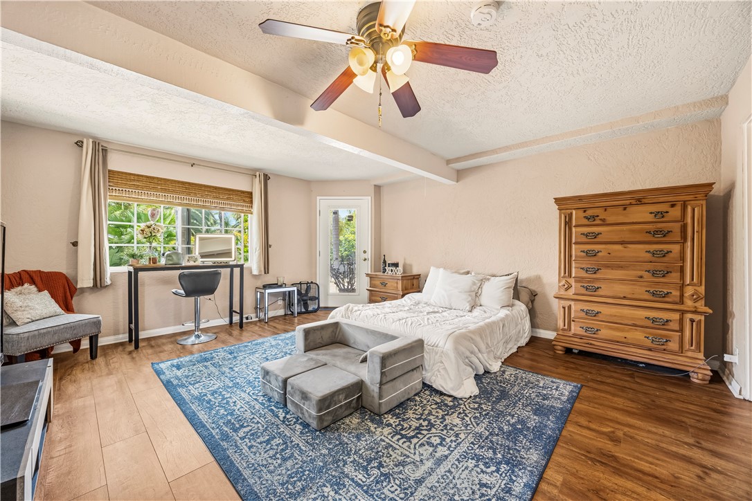 1485 Vía Ladera Fallbrook, CA 92028 - Photo 34 of 43 a living room with furniture and wooden floor