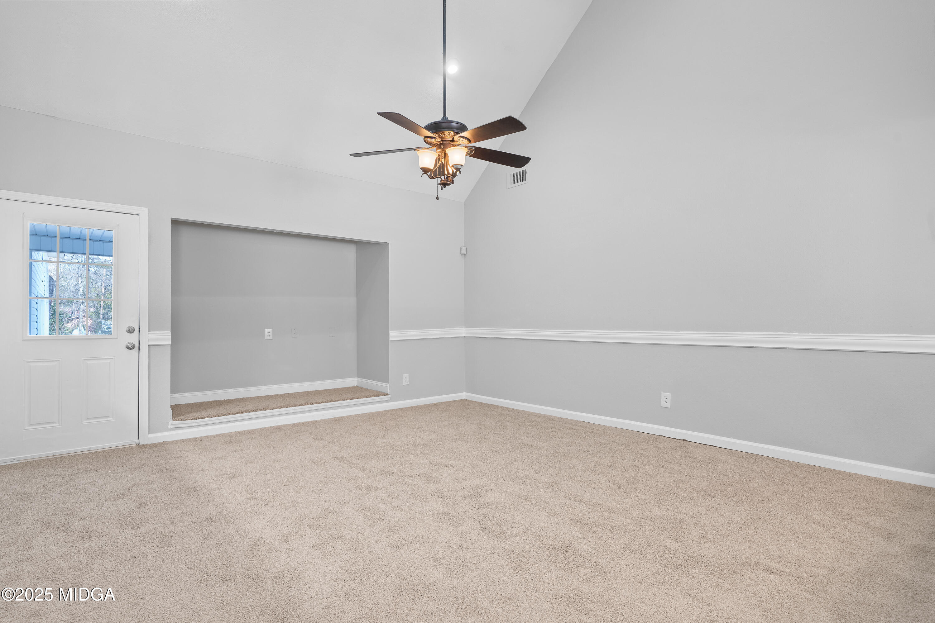 7513 Columbus Road Lizella, GA 31052 - Photo 13 of 56 a view of a room with a fan