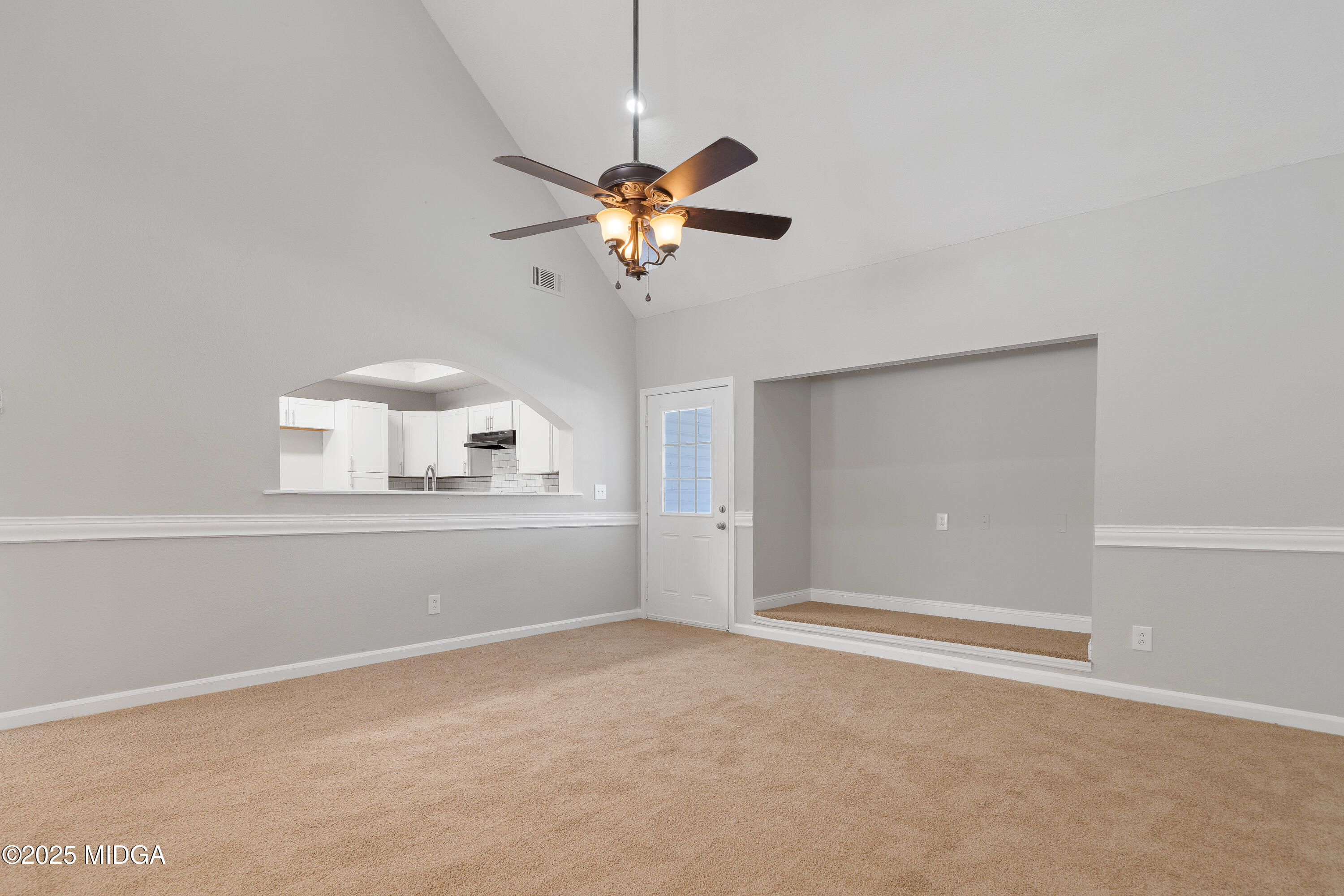 7513 Columbus Road Lizella, GA 31052 - Photo 17 of 56 a view of room with a ceiling fan and window