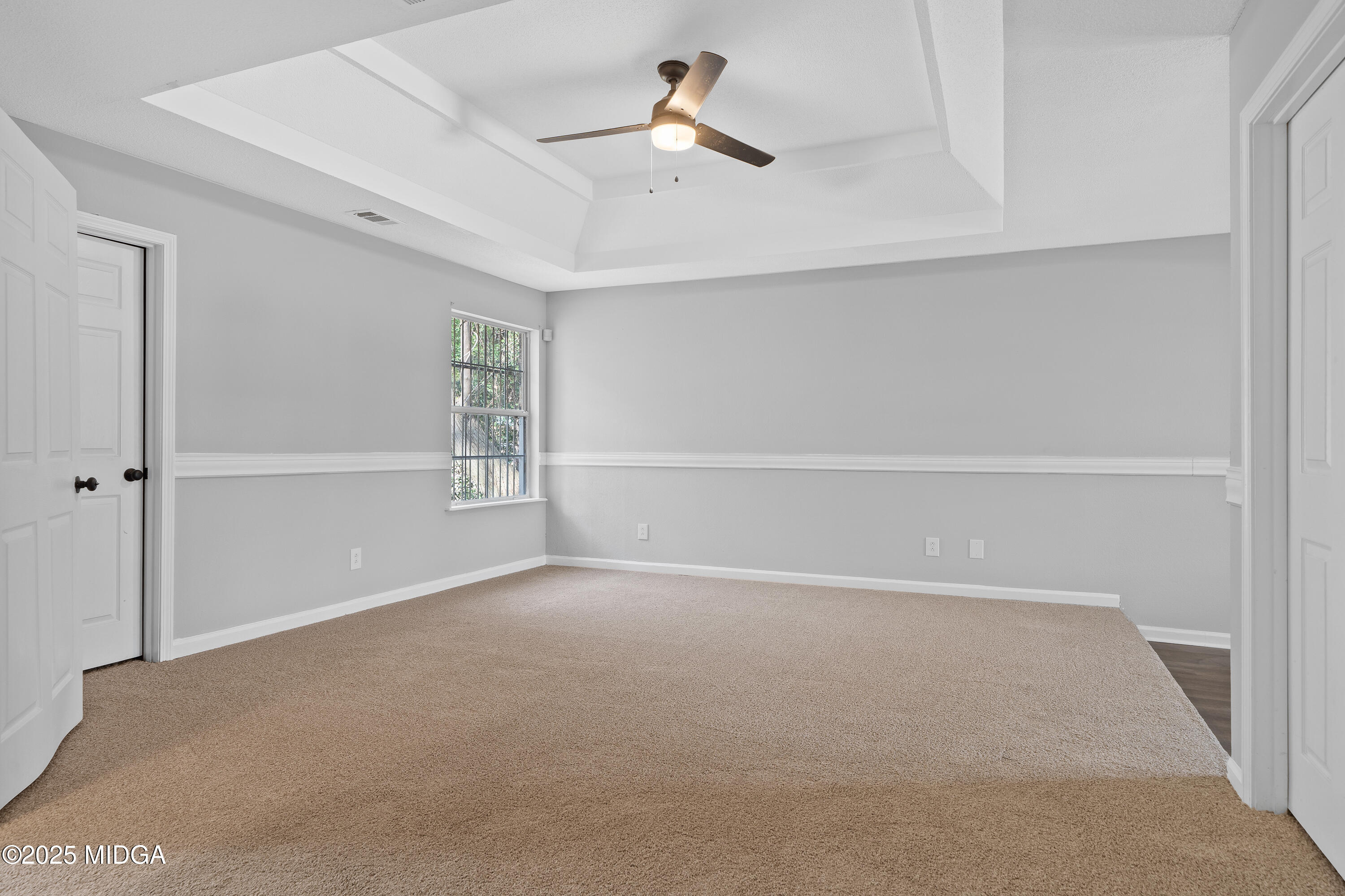 7513 Columbus Road Lizella, GA 31052 - Photo 27 of 56 a view of an empty room with a window