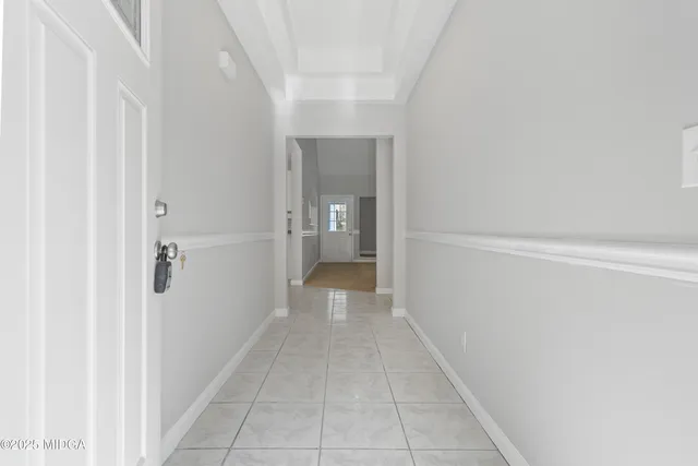 en empty room with windows