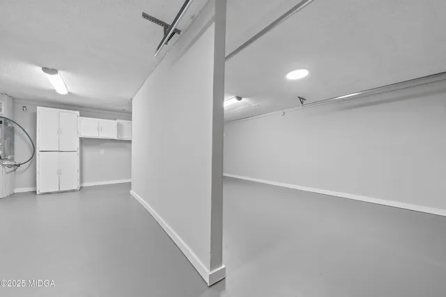 an empty room with windows