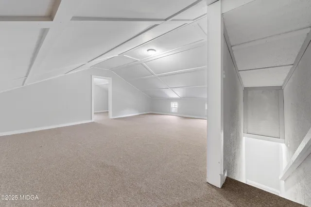 a view of hallway with stairs