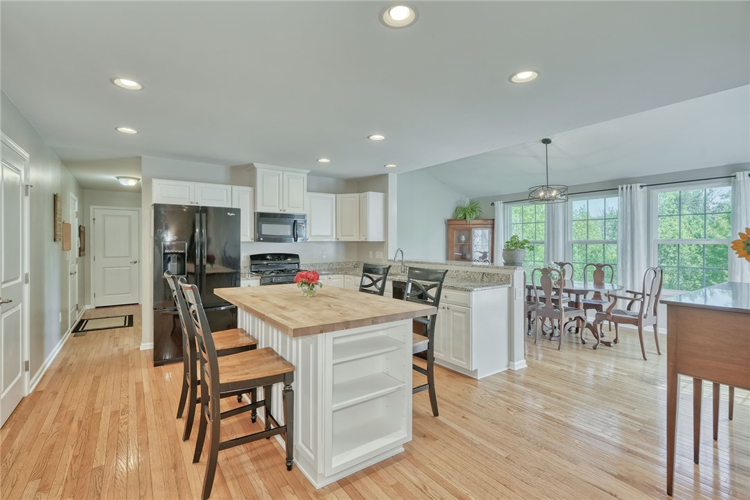 32 Ashlyn Rise Penfield, NY 14450 - Photo 13 of 50 Eat-in kitchen with custom built moveable island,