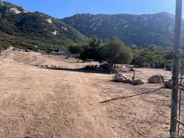 a view of a backyard with mountain view