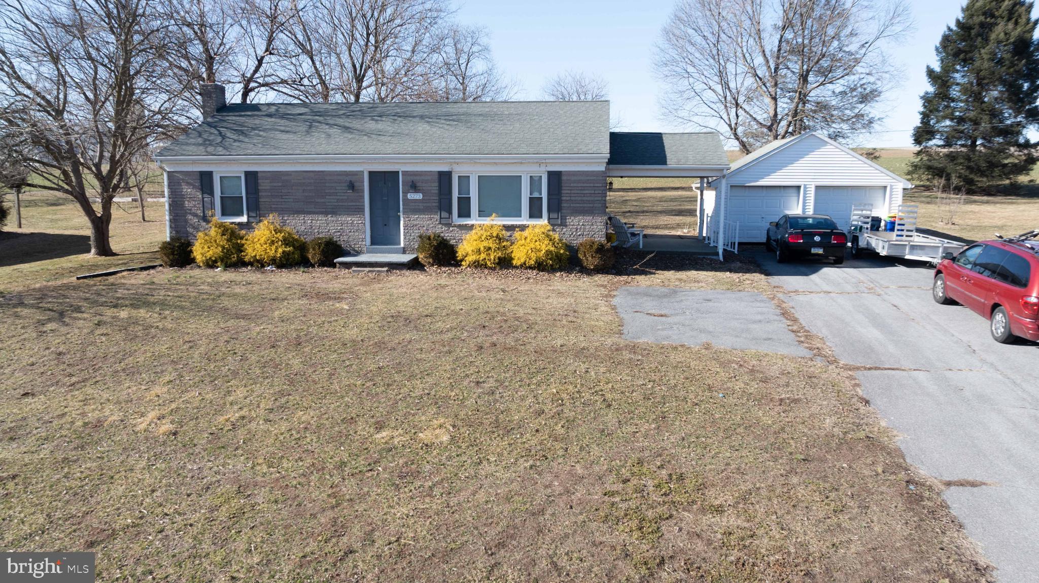 5273 Denlinger Road Gap, PA 17527 - Photo 1 of 54 a front view of a house with cars parked in front of house